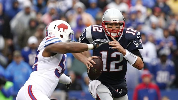 Oct 30, 2016; Orchard Park, NY, USA; Buffalo Bills inside linebacker Preston Brown (52) sacks New England Patriots quarterback Tom Brady (12) during the first half at New Era Field. Mandatory Credit: Kevin Hoffman-USA TODAY Sports