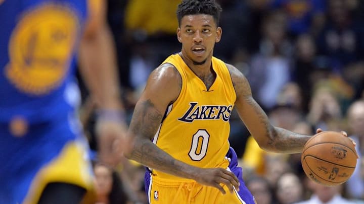 Oct 19, 2016; San Diego, CA, USA; Los Angeles Lakers forward Nick Young (0) brings the ball up against the Golden State Warriors during the third quarter at Valley View Casino Center. Mandatory Credit: Jake Roth-USA TODAY Sports
