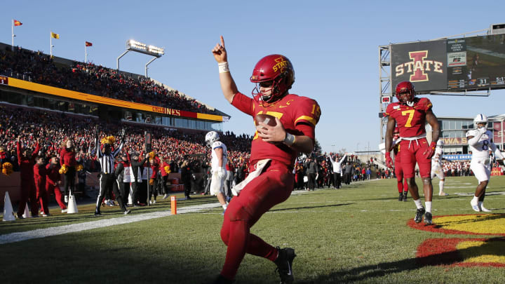 AMES, IA – NOVEMBER 23: Quarterback Brock Purdy #15 of the Iowa State Cyclones celebrates after scoring a touchdown as teammate wide receiver La’Michael Pettway #7 of the Iowa State Cyclones watches on in the second half of play at Jack Trice Stadium on November 23, 2019 in Ames, Iowa. The Iowa State Cyclones won 41-31 over the Kansas Jayhawks. (Photo by David Purdy/Getty Images)