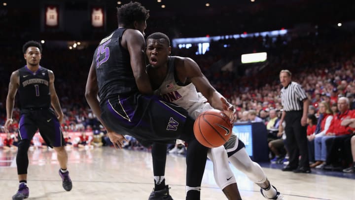 TUCSON, AZ – JANUARY 29: Kadeem Allen #5 of the Arizona Wildcats collides into Noah Dickerson #15 of the Washington Huskies as he drives to the basket during the first half of the college basketball game at McKale Center on January 29, 2017 in Tucson, Arizona. (Photo by Christian Petersen/Getty Images)