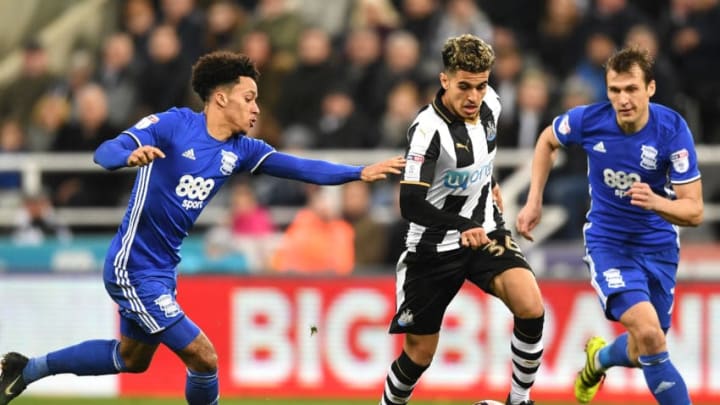 NEWCASTLE UPON TYNE, ENGLAND - JANUARY 18: Yasin Ben El-Mhanni of Newcastle United takes on Josh Cogley (L) of Birmingham City during The Emirates FA Cup Third Round Replay match between Newcastle United and Birmingham City at St James' Park on January 18, 2017 in Newcastle upon Tyne, England. (Photo by Gareth Copley/Getty Images)