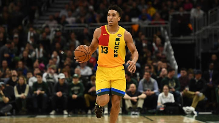 MILWAUKEE, WISCONSIN - JANUARY 07: Malcolm Brogdon #13 of the Milwaukee Bucks handles the ball during a game against the Utah Jazz at Fiserv Forum on January 07, 2019 in Milwaukee, Wisconsin. NOTE TO USER: User expressly acknowledges and agrees that, by downloading and or using this photograph, User is consenting to the terms and conditions of the Getty Images License Agreement. (Photo by Stacy Revere/Getty Images)