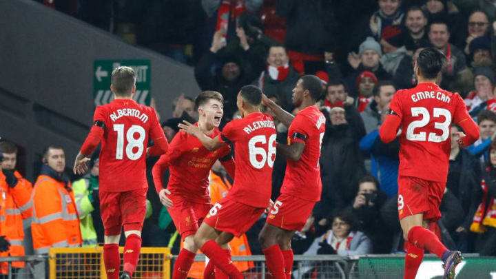 Liverpool's Ben Woodburn celebrates scoring his side's second goal of the game with teammates during the EFL Cup, Quarter Final match at Anfield, Liverpool. (Photo by Martin Rickett/PA Images via Getty Images)