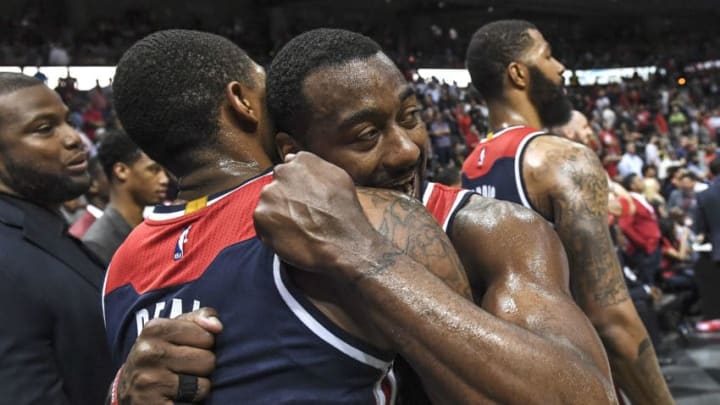 ATLANTA, GA - APRIL 28:Washington Wizards guard John Wall (2) hugs Washington Wizards guard Bradley Beal (3) after the Wizards won Game Six of the NBA Playoffs First Round between the Washington Wizards and the Atlanta Hawks at the Phillips Arena on Friday, April 28, 2017. The Washington Wizards defeated the Atlanta Hawks 115-99 to win the series. (Photo by Toni L. Sandys/The Washington Post via Getty Images)