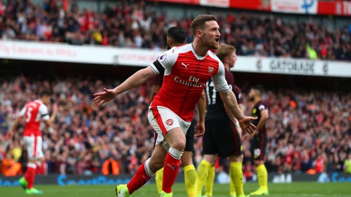 LONDON, ENGLAND - APRIL 02: Shkodran Mustafi of Arsenal celebrates scoring his sides second goal during the Premier League match between Arsenal and Manchester City at Emirates Stadium on April 2, 2017 in London, England. (Photo by Clive Rose/Getty Images)