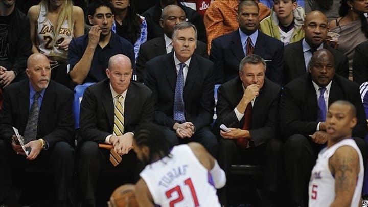 January 4, 2013; Los Angeles, CA, USA; Los Angeles Lakers trainer Gary Vitti, assistant Steve Clifford, head coach Mike D’Antoni, assistant Dan D’Antoni and assistant Chuck Pearson during the game against the Los Angeles Clippers at the Staples Center. Clippers won 107-102. Mandatory Credit: Jayne Kamin-Oncea-USA TODAY Sports