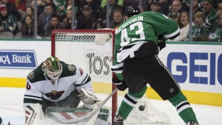Jan 9, 2016; Dallas, TX, USA; Minnesota Wild goalie Devan Dubnyk (40) makes a save against Dallas Stars right wing Valeri Nichushkin (43) during the second period at American Airlines Center. Mandatory Credit: Jerome Miron-USA TODAY Sports