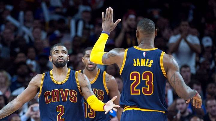 Apr 22, 2016; Auburn Hills, MI, USA; Cleveland Cavaliers guard Kyrie Irving (2) high fives forward LeBron James (23) during the third quarter against the Detroit Pistons in game three of the first round of the NBA Playoffs at The Palace of Auburn Hills. Mandatory Credit: Tim Fuller-USA TODAY Sports