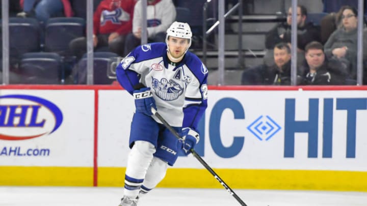 LAVAL, QC, CANADA - MARCH 13: Cameron Gaunce #24 of the Syracuse Crunch skating up the ice in control of the puck against the Laval Rocket at Place Bell on March 13, 2019 in Laval, Quebec. (Photo by Stephane Dube /Getty Images)