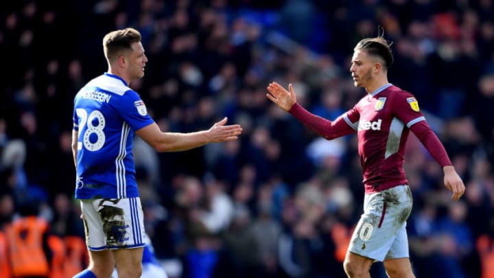 BIRMINGHAM, ENGLAND - MARCH 10: Jack Grealish of Aston Villa shakes hands with Michael Morrison of Birmingham City during the Sky Bet Championship match between Birmingham City and Aston Villa at St Andrew's Trillion Trophy Stadium on March 10, 2019 in Birmingham, England. (Photo by Alex Davidson/Getty Images)
