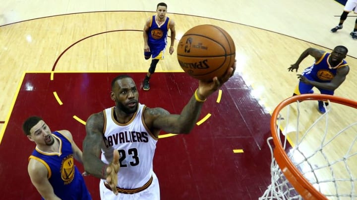 Jun 10, 2016; Cleveland, OH, USA; Golden State Warriors forward Draymond Green (23) shoots the ball against Golden State Warriors guard Klay Thompson (11) in game four of the NBA Finals at Quicken Loans Arena. Mandatory Credit: Ronald Martinez/Pool Photo via USA TODAY Sports