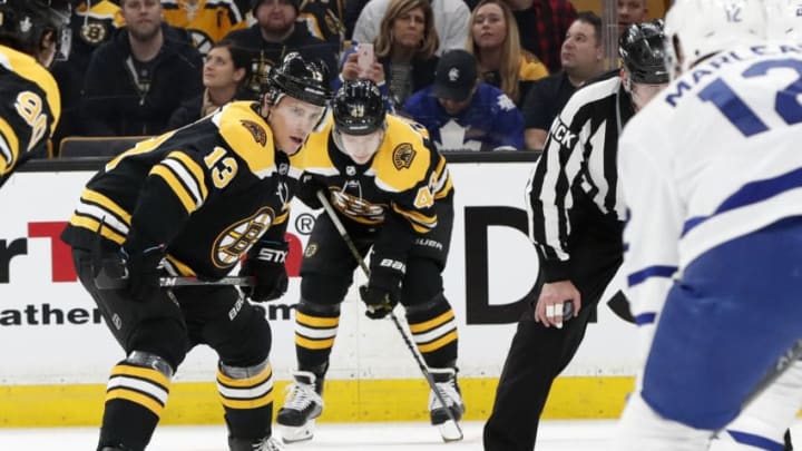 BOSTON, MA - APRIL 11: Boston Bruins center Charlie Coyle (13) checks the defense before a face off during Game 1 of the First Round between the Boston Bruins and the Toronto Maple Leafs on April 11, 2019, at TD Garden in Boston, Massachusetts. (Photo by Fred Kfoury III/Icon Sportswire via Getty Images)