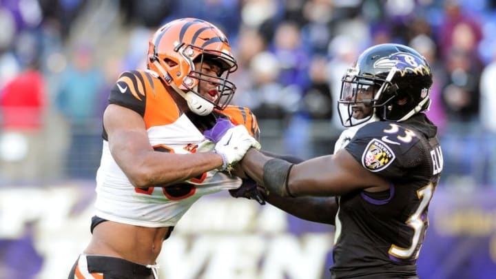 Nov 27, 2016; Baltimore, MD, USA; Cincinnati Bengals wide receiver Cody Core (16) is held by Baltimore Ravens safety Matt Elam (33) on the final play of the game, which resulted in a safety at M&T Bank Stadium. Mandatory Credit: Evan Habeeb-USA TODAY Sports