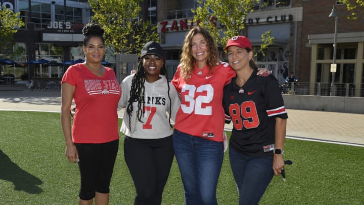 ROSEMONT, ILLINOIS - AUGUST 21: Candace Wilson, mother of Garrett Wilson of the Ohio State Buckeyes, Andrea Tate, mother of Sevyn Banks of the Ohio State Buckeyes, Jeny Borland, mother of Tuf Borland of the Ohio State Buckeyes and Kelly Farrell, the mother of Luke Farrell of the Ohio State Buckeyes pose for a photo during a rally outside of the Big Ten Conference headquarters on August 21, 2020 in Rosemont, Illinois. The Big Ten conference made the decision to delay the fall football season until the spring to protect players and staff as transmission of the COVID-19 virus continues to rise. (Photo by Quinn Harris/Getty Images)