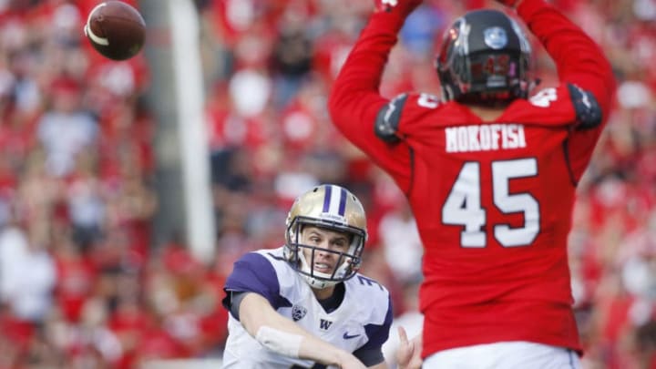 SALT LAKE CITY, UT - OCTOBER 29: Filipo Mokofisi #45 of the Utah Utes tries to block a pass of quarterback Jake Browning #3 of the Washington Huskies during the first half at Rice-Eccles Stadium on October 29, 2016 in Salt Lake City, Utah. (Photo by George Frey/Getty Images)