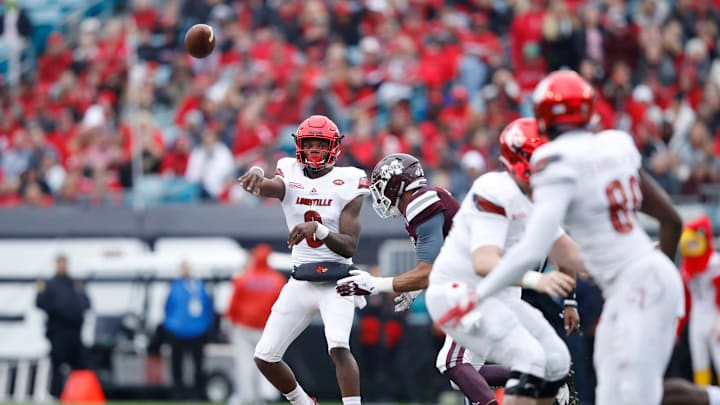 JACKSONVILLE, FL – DECEMBER 30: Lamar Jackson #8 of the Louisville Cardinals passes the ball in the first half of the TaxSlayer Bowl against the Mississippi State Bulldogs at EverBank Field on December 30, 2017 in Jacksonville, Florida. (Photo by Joe Robbins/Getty Images)