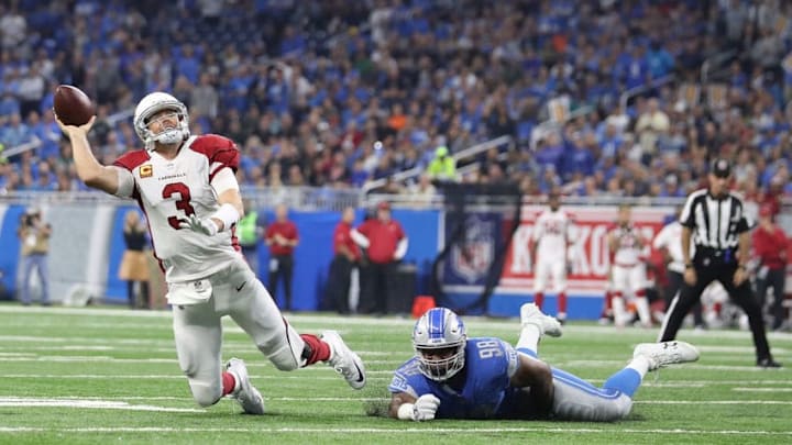 DETROIT, MI - SEPTEMBER 10: Jeremiah Ledbetter #98 of the Detroit Lions attempts to tackle Carson Palmer #3 of the Arizona Cardinals in the first half at Ford Field on September 10, 2017 in Detroit, Michigan. (Photo by Leon Halip/Getty Images)