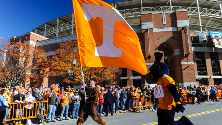 Nov 13, 2021; Knoxville, Tennessee, USA; Tennessee Volunteers mascots Davey Crockett and Smokey entertain the crowd at the Vol Walk before a game between the Tennessee Volunteers and the Georgia Bulldogs at Neyland Stadium. Mandatory Credit: Bryan Lynn-USA TODAY Sports