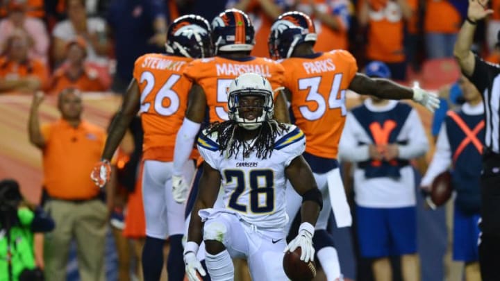 DENVER, CO - SEPTEMBER 11: Running back Melvin Gordon #28 of the Los Angeles Chargers races to being tackled for a loss in the third quarter of the game against the Denver Broncos at Sports Authority Field at Mile High on September 11, 2017 in Denver, Colorado. (Photo by Dustin Bradford/Getty Images)