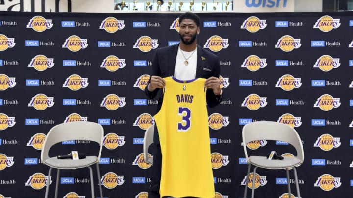 EL SEGUNDO, CALIFORNIA - JULY 13: Anthony Davis poses with his jersey as he is introduced as the newest player of the Los Angeles Lakers during a press conference at UCLA Health Training Center on July 13, 2019 in El Segundo, California. NOTE TO USER: User expressly acknowledges and agrees that, by downloading and/or using this Photograph, user is consenting to the terms and conditions of the Getty Images License Agreement. (Photo by Kevork Djansezian/Getty Images)