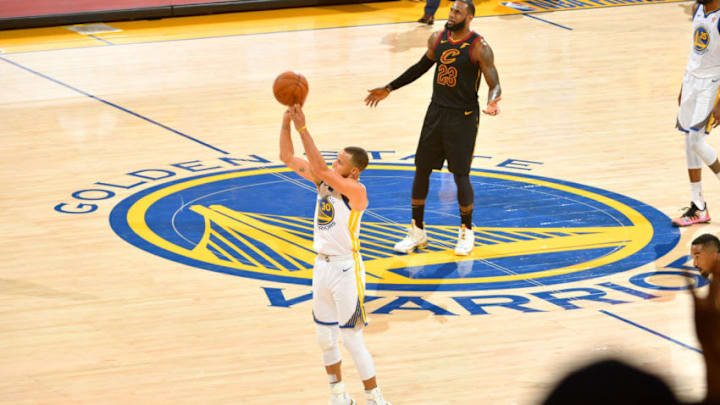 OAKLAND, CA - MAY 31: Stephen Curry #30 of the Golden State Warriors shoots the ball against the Cleveland Cavaliers in Game One of the 2018 NBA Finals on May 31, 2018 at ORACLE Arena in Oakland, California. NOTE TO USER: User expressly acknowledges and agrees that, by downloading and/or using this photograph, user is consenting to the terms and conditions of the Getty Images License Agreement. Mandatory Copyright Notice: Copyright 2018 NBAE (Photo by Jesse D. Garrabrant/NBAE via Getty Images)