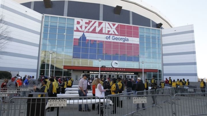 Dec 5, 2015; Atlanta, GA, USA; Fans are screened by security personnel as the enter the stadium prior to the 2015 SEC Championship Game between the Florida Gators and the Alabama Crimson Tide at the Georgia Dome. Mandatory Credit: Butch Dill-USA TODAY Sports