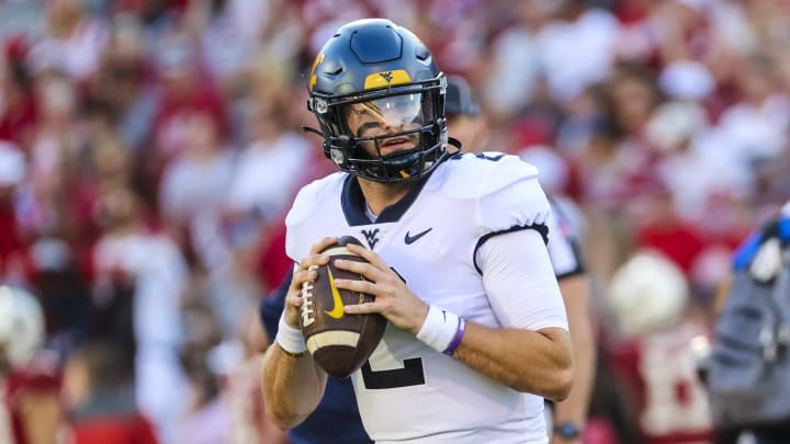 Sep 25, 2021; Norman, Oklahoma, USA; West Virginia Mountaineers quarterback Jarret Doege (2) throws before the game against the Oklahoma Sooners at Gaylord Family-Oklahoma Memorial Stadium. Mandatory Credit: Kevin Jairaj-USA TODAY Sports
