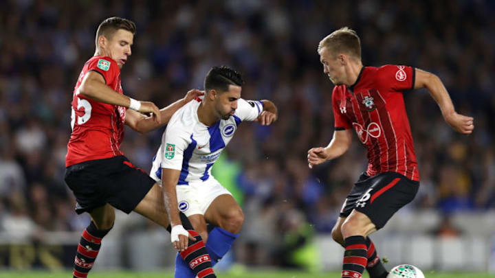 BRIGHTON, ENGLAND - AUGUST 28: Beram Kayal of Brighton and Hove Albion is challenged by Jan Bednarek of Southampton and James Ward-Prowse of Southampton during the Carabao Cup Second Round match between Brighton & Hove Albion and Southampton at American Express Community Stadium on August 28, 2018 in Brighton, England. (Photo by Bryn Lennon/Getty Images)
