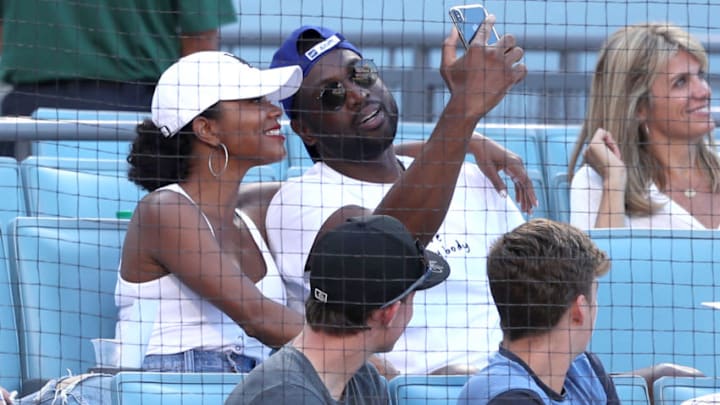 Gabrielle Union and Dwyane Wade attend The Los Angeles Dodgers Game(Photo by Jerritt Clark/Getty Images)