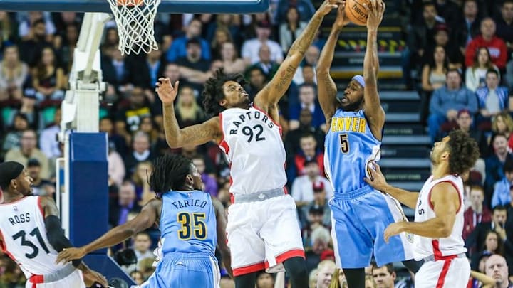Oct 3, 2016; Calgary, Alberta, CAN; Denver Nuggets forward Will Barton (5) shoots the ball as Toronto Raptors center Lucas Nogueira (92) defends during the first quarter at Scotiabank Saddledome. Mandatory Credit: Sergei Belski-USA TODAY Sports