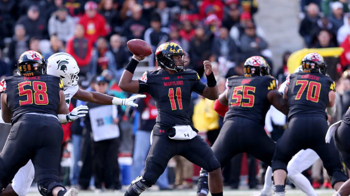 COLLEGE PARK, MD – NOVEMBER 03: Kasim Hill #11 of the Maryland Terrapins looks to pass against the Michigan State Spartans during the first half at Capital One Field on November 3, 2018 in College Park, Maryland. (Photo by Will Newton/Getty Images)