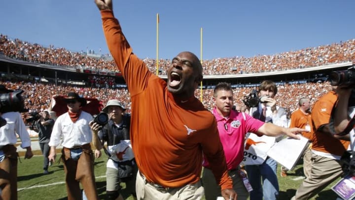 Oct 10, 2015; Dallas, TX, USA; Texas Longhorns head coach Charlie Strong celebrates winning the game against the Oklahoma Sooners during the Red River rivalry at Cotton Bowl Stadium. Texas won 24-17. Mandatory Credit: Tim Heitman-USA TODAY Sports