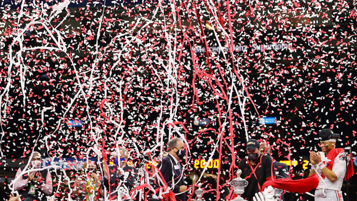 NEW ORLEANS, LOUISIANA – JANUARY 01: Confetti falls on head coach Ryan Day and Justin Fields #1 of the Ohio State Buckeyes after they defeated the Clemson Tigers 49-28 during the College Football Playoff semifinal game at the Allstate Sugar Bowl at Mercedes-Benz Superdome on January 01, 2021 in New Orleans, Louisiana. (Photo by Kevin C. Cox/Getty Images)