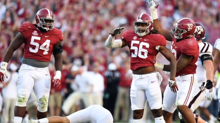 Oct 22, 2016; Tuscaloosa, AL, USA; Alabama Crimson Tide linebacker Tim Williams (56) celebrates his sack with defensive lineman Jonathan Allen (93) on Texas A&M Aggies quarterback Trevor Knight (8) during the third quarter at Bryant-Denny Stadium. Mandatory Credit: John David Mercer-USA TODAY Sports