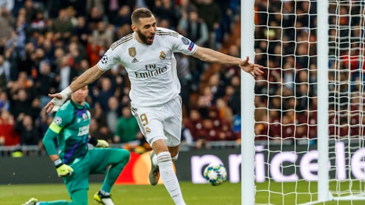 MADRID, SPAIN - NOVEMBER 06: Karim Benzema of Real Madrid celebrates his goal with team mates during the UEFA Champions League group A match between Real Madrid and Galatasaray at Bernabeu on November 6, 2019 in Madrid, Spain. (Photo by TF-Images/Getty Images)