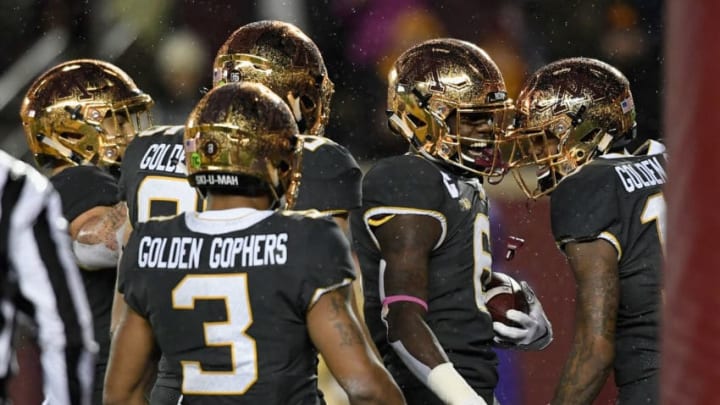 MINNEAPOLIS, MN - OCTOBER 26: The Minnesota Golden Gophers congratulate teammate Tyler Johnson #6 on a touchdown against the Indiana Hoosiers during the second quarter of the game on October 26, 2018 at TCF Bank Stadium in Minneapolis, Minnesota. (Photo by Hannah Foslien/Getty Images)