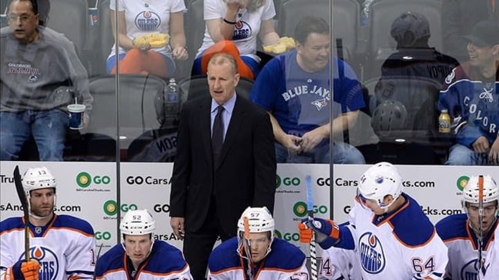 April 19 2013; Denver, CO, USA; Edmonton Oilers head coach Ralph Krueger on his bench in the first period against the Colorado Avalanche at the Pepsi Center. Mandatory Credit: Ron Chenoy-USA TODAY Sports