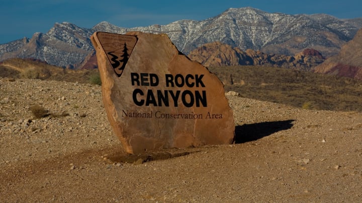 SUMMERLIN, NV – DECEMBER 26: A large painted boulder greets visitors to the Red Rock Canyon National Conservation Area on December 26, 2010 near Summerlin, Nevada. Red Rock Canyon, located 15 miles west of Las Vegas, is a 200,000 acre Federal desert preserve. (Photo by George Rose/Getty Images)