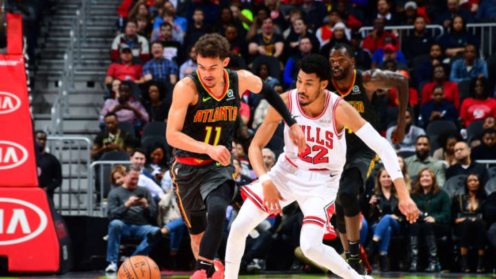 ATLANTA, GA - MARCH 1: Trae Young #11 of the Atlanta Hawks looks to pick up loose ball against the Chicago Bulls on March 1, 2019 at State Farm Arena in Atlanta, Georgia. NOTE TO USER: User expressly acknowledges and agrees that, by downloading and/or using this Photograph, user is consenting to the terms and conditions of the Getty Images License Agreement. Mandatory Copyright Notice: Copyright 2019 NBAE (Photo by Scott Cunningham/NBAE via Getty Images)
