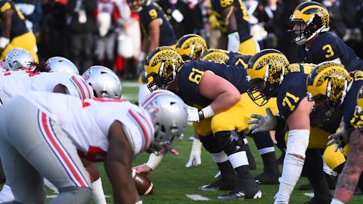 Nov 28, 2015; Ann Arbor, MI, USA; Michigan Wolverines offensive line lines up against the Ohio State Buckeyes defense line during the game at Michigan Stadium. Mandatory Credit: Tim Fuller-USA TODAY Sports