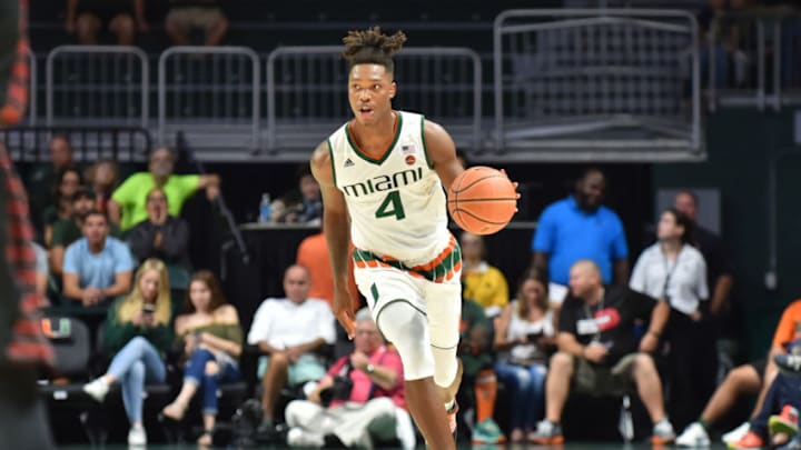 MIAMI, FL - NOVEMBER 10: Lonnie Walker IV #4 of the Miami (Fl) Hurricanes brings the basketball upcoast during the second half against the Gardner Webb Runnin Bulldogs at The Watsco Center on November 10, 2017 in Miami, Florida. (Photo by Eric Espada/Getty Images)