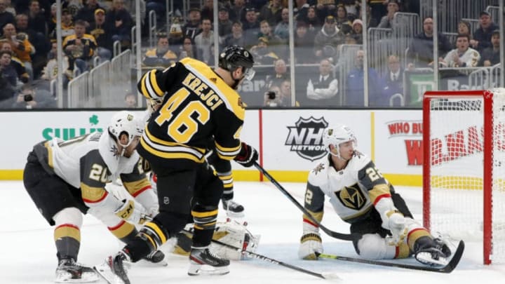 BOSTON, MA - JANUARY 21: Boston Bruins center David Krejci (46) scores the game winner besting Vegas Golden Knights defenseman Nick Holden (22) during a game between the Boston Bruins and the Vegas Golden Knights on January 21, 2020, at TD Garden in Boston, Massachusetts. (Photo by Fred Kfoury III/Icon Sportswire via Getty Images)