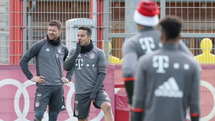 MUNICH, GERMANY - FEBRUARY 27: (EXCLUSIVE COVERAGE) Xabi Alonso (L) and Thiago of FC Bayern Muenchen chat during a training session at the club's Saebener Strasse training ground on February 27, 2017 in Munich, Germany. (Photo by A. Beier/Getty Images for FC Bayern)