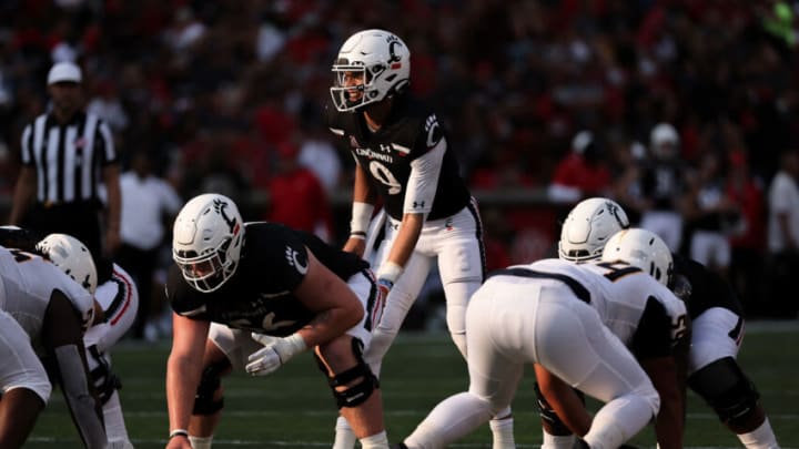 CINCINNATI, OHIO - SEPTEMBER 11: Desmond Ridder #9 of the Cincinnati Bearcats lines up for a play in the third quarter against the Murray State Racers at Nippert Stadium on September 11, 2021 in Cincinnati, Ohio. (Photo by Dylan Buell/Getty Images)