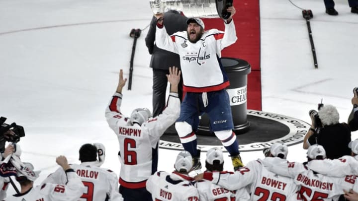 LAS VEGAS, NV - JUNE 07: Alex Ovechkin #8 of the Washington Capitals hoists the Stanley Cup after the team's 4-3 win over the Vegas Golden Knights in Game Five of the 2018 NHL Stanley Cup Final at T-Mobile Arena on June 7, 2018 in Las Vegas, Nevada. (Photo by David Becker/NHLI via Getty Images)
