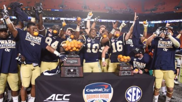 Dec 31, 2014; Miami Gardens, FL, USA; Georgia Tech Yellow Jackets players celebrate their victory in the Orange Bowl game at Sun Life Stadium. Mandatory Credit: Brad Barr-USA TODAY Sports