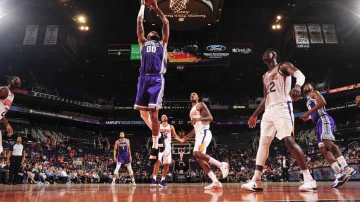 PHOENIX, AZ - OCTOBER 1: Willie Cauley-Stein #00 of the Sacramento Kings dunks the ball against the Phoenix Suns during a pre-season game on October 1, 2018 at Talking Stick Resort Arena in Phoenix, Arizona. NOTE TO USER: User expressly acknowledges and agrees that, by downloading and or using this photograph, user is consenting to the terms and conditions of the Getty Images License Agreement. Mandatory Copyright Notice: Copyright 2018 NBAE (Photo by Barry Gossage/NBAE via Getty Images)