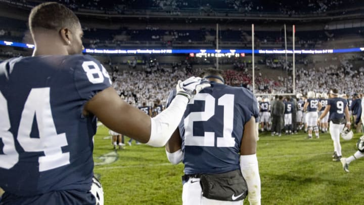 Penn State's Juwan Johnson (84) tries to comfort cornerback Amani Oruwariye (21) after a 21-17 loss to Michigan State at Beaver Stadium in University Park, Pa., on Saturday, Oct. 13, 2018. (Abby Drey/Centre Daily Times/TNS via Getty Images)