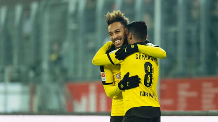 ESSEN, GERMANY - JANUARY 19: Pierre-Emerick Aubameyang celebrates after scoring his team's 1st goal ofÊBorussia Dortmund with Ilkay Guendogan during the friendly match between Borussia Dortmund v Sparta Prague on January 19, 2016 in Essen, Germany. (Photo by Alexandre Simoes/Borussia Dortmund/Getty Images)
