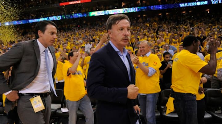 OAKLAND, CA. - MAY 02: Denver Nuggets President and Governor Josh Kroenke (L) and Owner Stan Kroenke walk off the court after the Nuggets lose to the Warriors 92-88 in Game 6 of the first round NBA Playoffs May 2, 2013 at Oracle Arena. (Photo By John Leyba/The Denver Post via Getty Images)